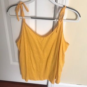 Yellow tank with tie straps